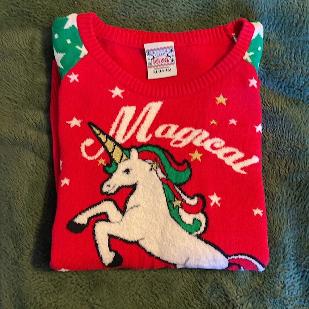 Christmas sweater. Unicorn and stars. Gently used. soft.